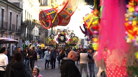 Float moving down street filled with market stalls on the street parade during Stock Footage 303318760