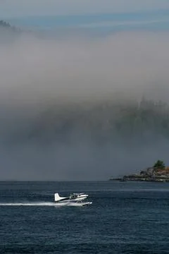 Float Plane Accelerates for Takeoff in Tofino on Vancouver Island in Canada Stock Photos