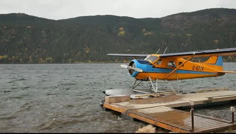 Float Plane at Dock Pan Stock Footage