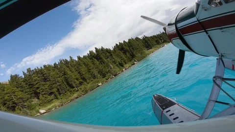 Float Plane Docking On A Backcountry Lake Video stock 115064852