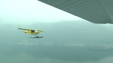 Float plane flying on Como lake  Stock Footage 43316903