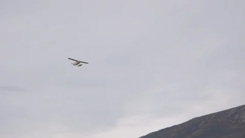 Float Plane Flying Overhead in Alatna River Valley Alaska Gates of the Arctic Stock Footage 121640165