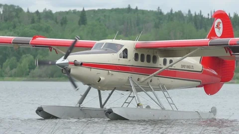 Float plane on a lake with propeller spinning Stock Footage 88344058