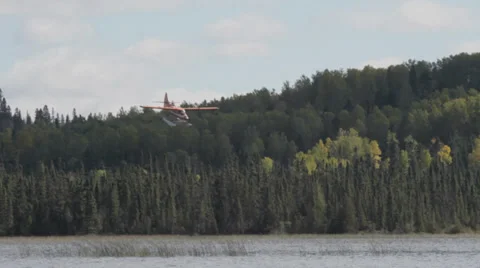 Float Plane Land on Lake Stock Footage 35570029