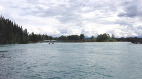 Float Plane Landing By River Stock Footage 46484564