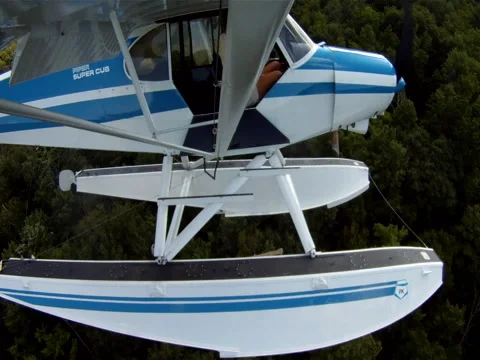Float plane with mounted camera under wing strut Stock Footage 50621444