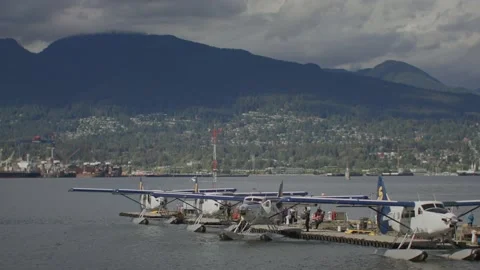 Float planes in ocean harbor getting ready for takeoff 库存影片 220310069