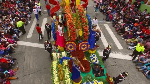 Float with Roses and Red Chili Peppers Passes Under Overhead Camera Video stock 73040975