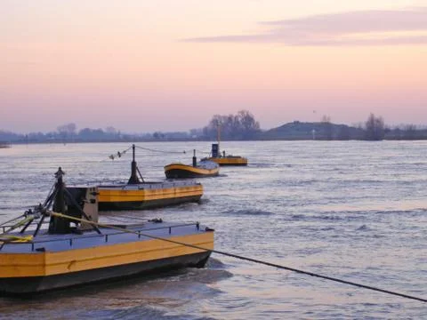 Floaters of cable anchor of ferry in river rhine Stock Photos