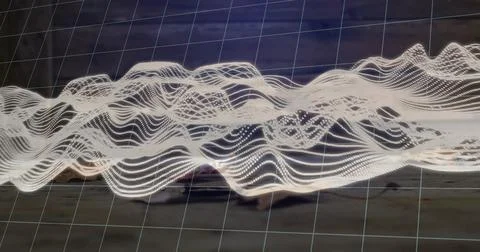 Floating 3D undulating wave pattern hovering in wooden workshop, with projected Stock Photos