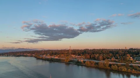 Floating 4K+ Hyperlapse / Timelapse over Fraser River during beautiful sunset Stock Footage 76452947