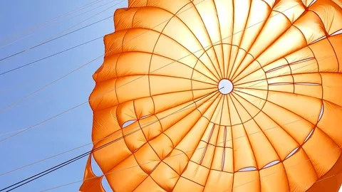 Floating in the air against the win of Parasailing 库存影片 79638109