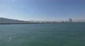 Floating along the shore towards Barcelona 4k or 4k+ Resolution