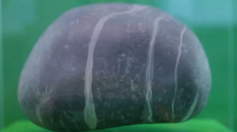 Floating and spinning stone 動画素材 40313958