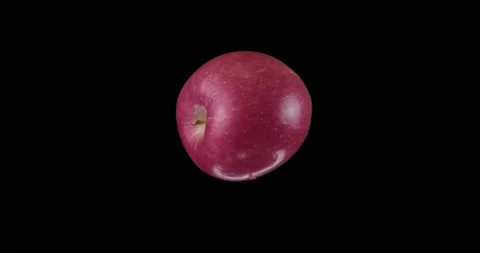 Floating apple rotating Black / Green Screen Stock Footage 233653386