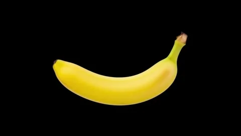 A floating banana isolated on black background Stock Footage 339340899