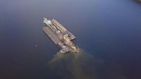 Floating Barge Extracting Sand and Gravel from River Bottom. Aerial View Stock Footage 165494538