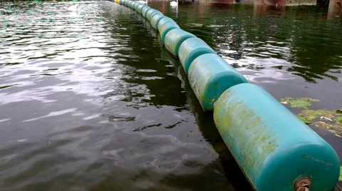 Floating barrier on a river Video stock 45603978