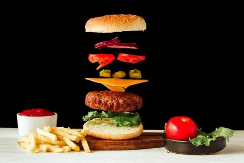 Floating beef burger Stock Photos