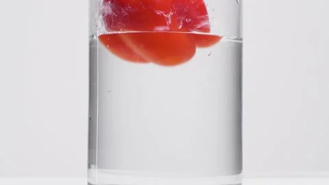 Floating bell pepper in the water Stock Footage 132861338