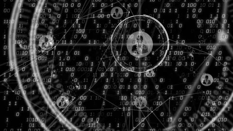 Floating binary digits starting scan, user silhouette spinning rings, revealing Stock Footage 310298285