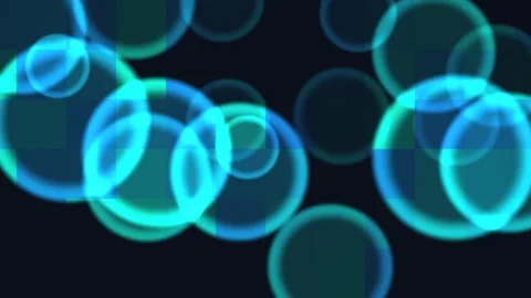 Floating blue circles in a dark background create a lively Stock Footage 338004611
