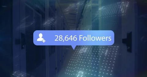 Floating blue follower bubble hovering over dim data center aisle, with server Stock Photos