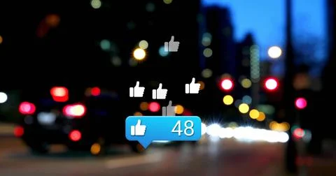 Floating blue notification bubble with thumbs-up 48 hovering over night street, Illustrazione stock