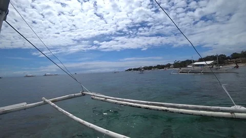 Floating boat in cloudy weather overlooking other boats by action cam Stock Footage 127841192