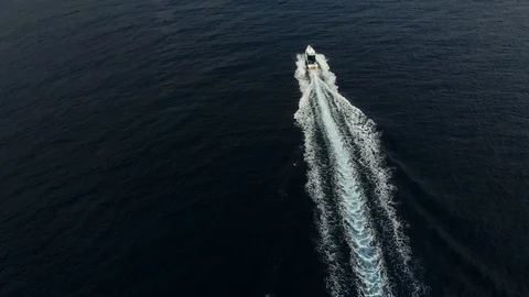 A floating boat in the indian ocean in Bali Stock Footage 125994053