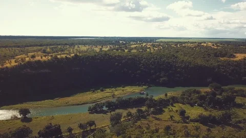 Floating boat on a river Stock Footage 100755884
