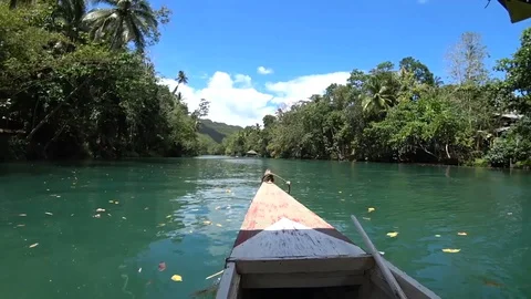 Floating boat on the river in the jungle by action cam Stock Footage 127841168