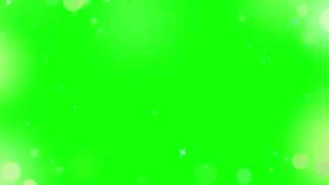Floating bokeh light particles overlaying vibrant green background for creative Stock-Footage 345332964
