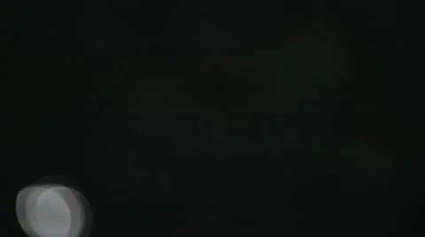 Floating bokeh of the sun glares reflected from water (Ultra HD, UHD, 4K) Stock Footage 42804576