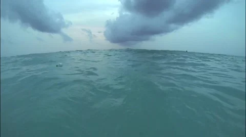 floating bottle with cork in ocean at wa... | Stock Video | Pond5