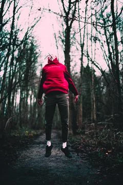 Floating boy in the woods Stockfoto's