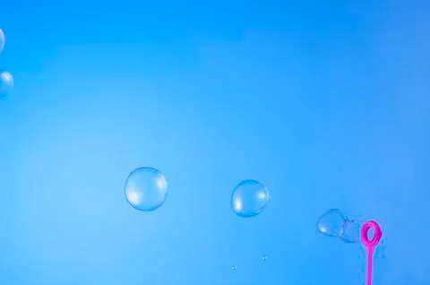 Floating bubble soap in the blue sky Stock Photos