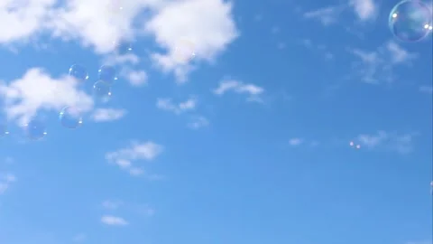 Floating Bubbles Against Blue Sky Stock Footage 279770447