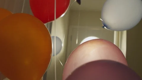 Floating bunch of colorful balloons inside a house Vídeo Stock 120382456