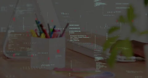 Floating C++ code dancing above desk, showcasing laptop, pens, notebook, plant Video stock 307436179