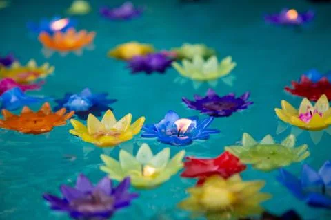 Floating candel flower on eater with flame 写真素材