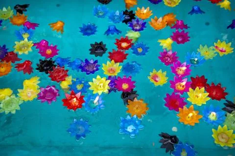 Floating candel flower on eater with flame Stock Photos