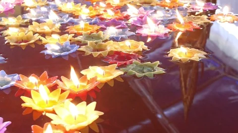 Floating candle in Thai temple for good fortune Video stock 100997240
