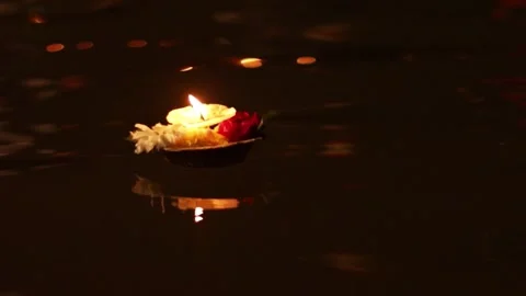 Floating Candle on Water at Night Stock Footage 340376529