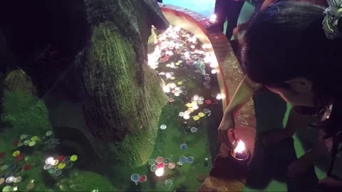 Floating Candles, Buddha Statues in Cave, Golden Mount Temple, Bangkok, Thailand Stock Footage 277455495