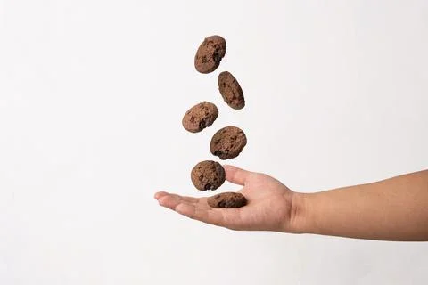 Floating chocolate chips cookies Stock Photos