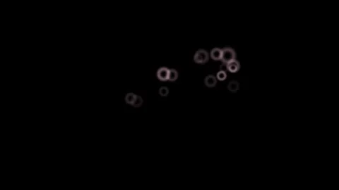 Floating circles in dark space create a unique visual Stock Footage 339082667