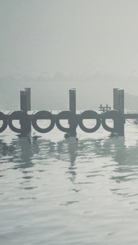 Floating circular shapes on water in a quiet area at dawn Stock Footage 339106700