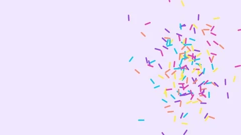 Floating cloud of colorful sprinkles on the right side with empty left copy 库存影片 348295960