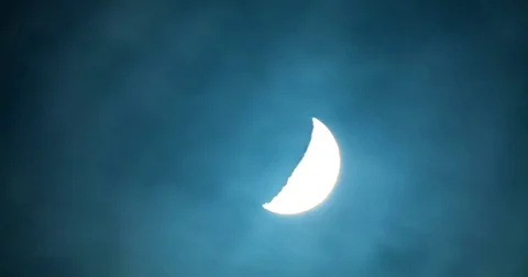 Floating clouds and half moon at night Stock Footage 77768526